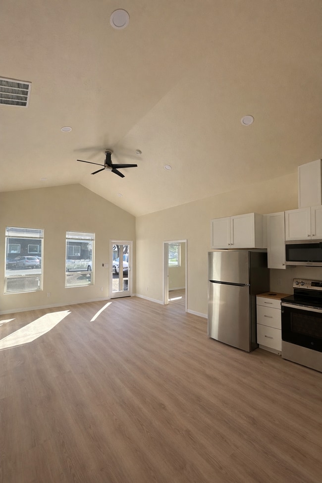 Building Photo - Bright & New 2 Bed / 2 Bath with Vaulted Ceilings & Covered Parking!