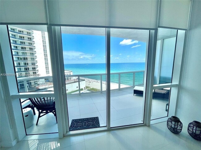Building Photo - 15811 Collins Ave