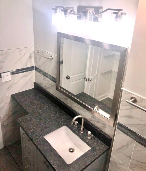 New lights, mirror & hardware. - 771 56th St