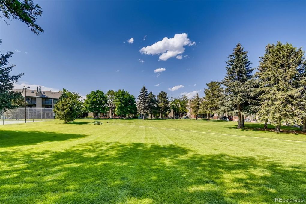 One of two large green spaces in the condo community - 3656 S Depew St