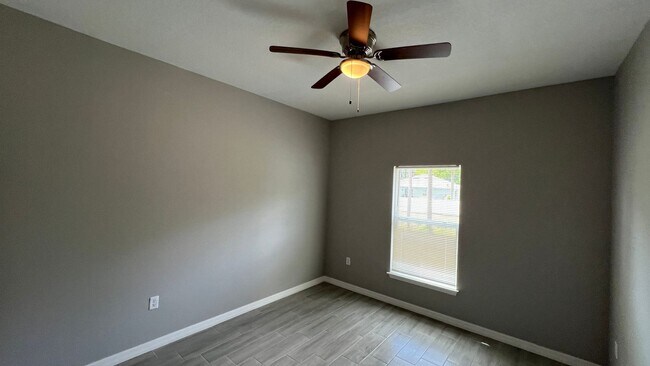 Building Photo - Smart & Stylish 3BD/2BA Palm Bay Home – Modern Upgrades, No Water Bills!