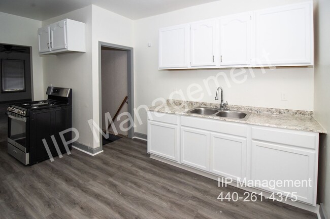 Building Photo - Spacious 4-Bedroom Gem with Modern Upgrade...