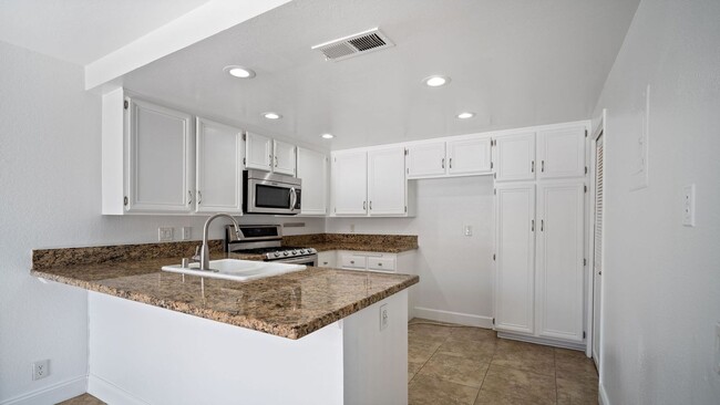 Building Photo - Upgraded 2-Bedroom Carriage Townhome with ...