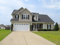 Building Photo - Beautiful 4 Bedroom Home with Spacious Backyard!