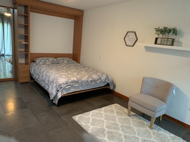 Queen size Murphy bed opened - 345 Swall S Dr