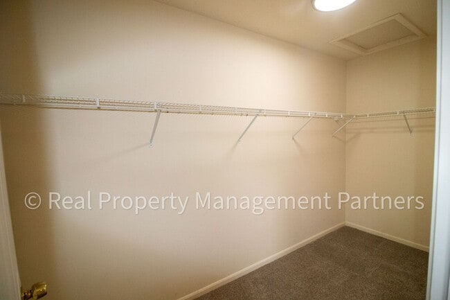 Building Photo - Forest Hills 3 Bed Townhome with Garage, Pond View and Some Utilities Included