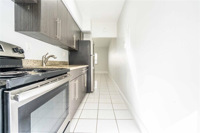 Building Photo - 8330 Byron Ave