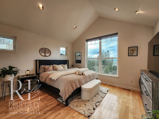 Building Photo - Light-Filled View Home with Vaulted Ceilings & Warm Wood Finishes