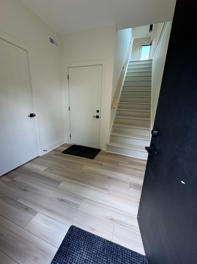 Building Photo - Vaulted Ceilings & Hardwood Floors in This Charming Indianapolis L