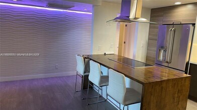 Building Photo - 19390 Collins Ave