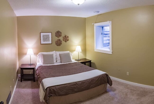 Building Photo - Spacious 5-Bedroom Minneapolis Gem with Gas Fireplace & Finished Basement