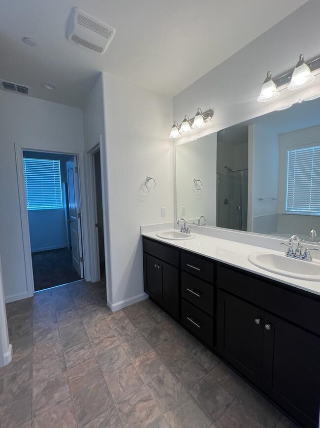 Building Photo - Welcome to modern living in a secure, gated community!