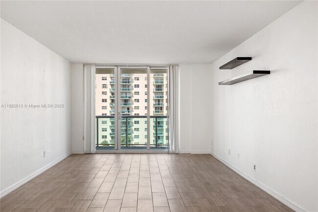Building Photo - 19380 Collins Ave