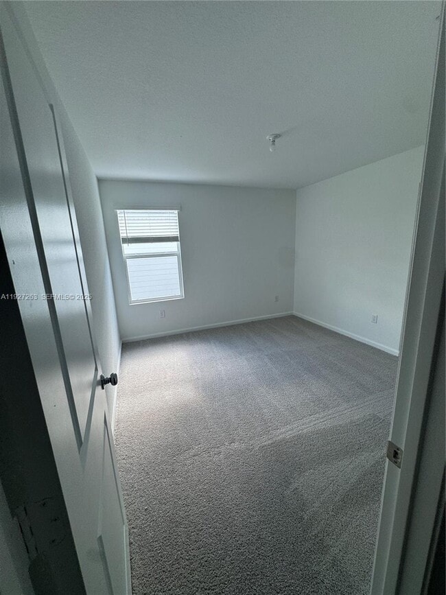 Building Photo - 5837 NW Sweetwood Dr