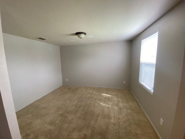 Building Photo - Formal Living and Dining on both sides of ...