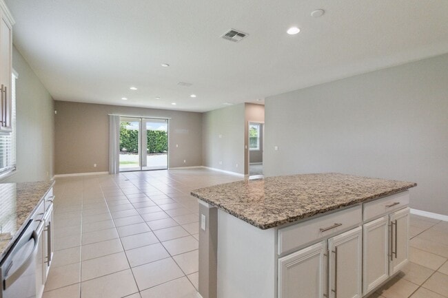 Building Photo - Gorgeous Energy Efficient 4/2 Home in Gated Community Close to Lake Nona