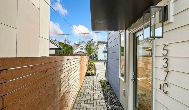 Building Photo - Brand-New Modern Townhome with Rooftop Deck, Bonus Rec Room & Designer Finishes