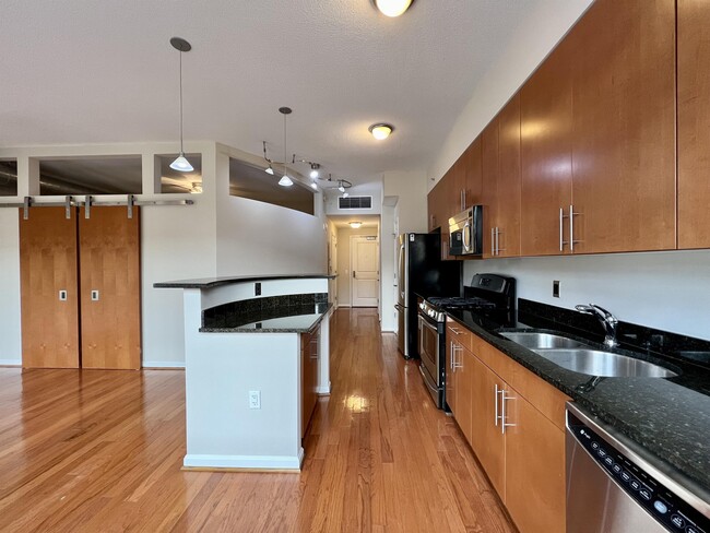 Building Photo - 1390 Kenyon St NW