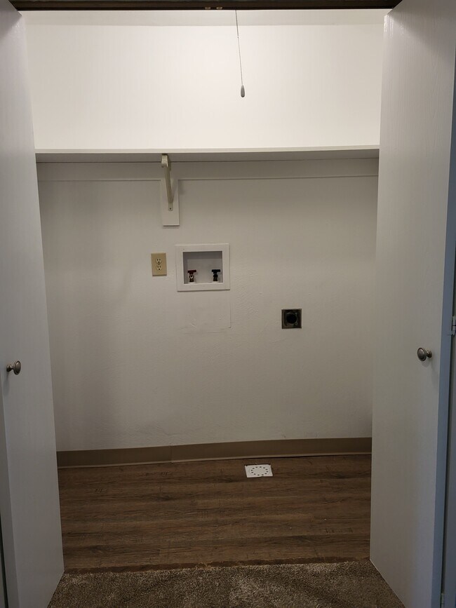 Laundry hook up upstairs between bedrooms - 9505 Centerbrook Ct