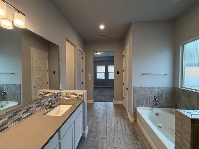 Building Photo - Luxury Multi-Gen (2 living areas) Single Story 3 Car Garage New Construction Available in Prestig...