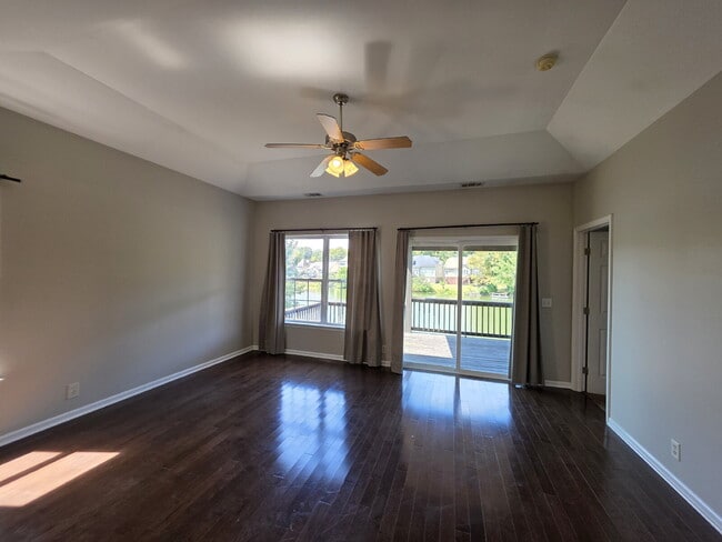 Building Photo - Lakefront 3BR/3BA with Covered Deck, Garage & Community Pool