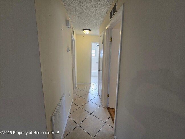 Building Photo - 8915 Woodmill Dr