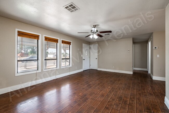 Building Photo - LARGE FENCED YARD WITH DETACHED GARAGE