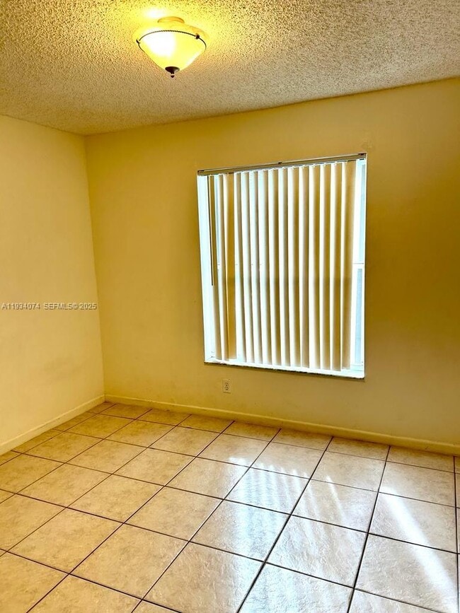 Building Photo - 4779 NW 5th Ct