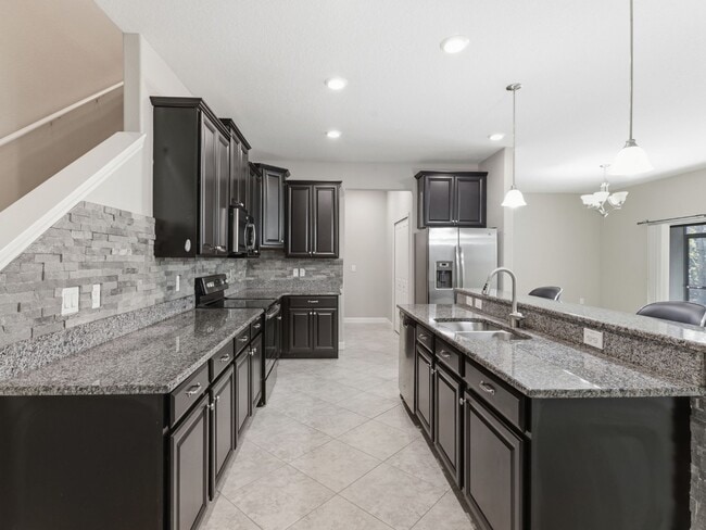 Building Photo - Stunning 3 BR + LOFT/2.5 BA /2-Car Garage townhome in the highly desirable GATED community of Hid...