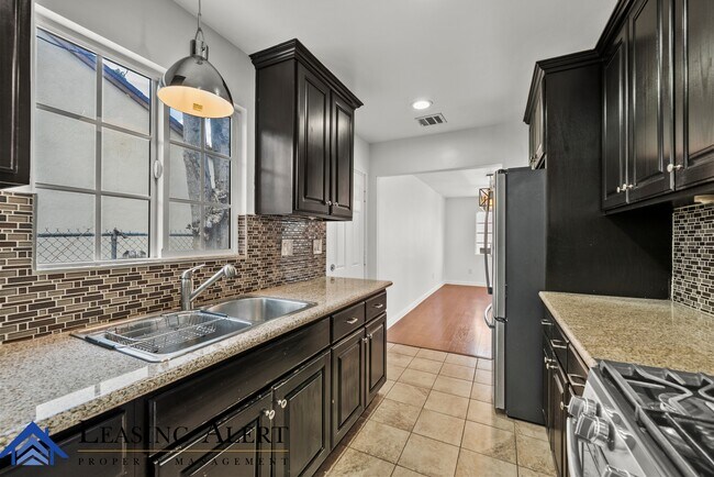 Building Photo - 7800 Lindley Ave