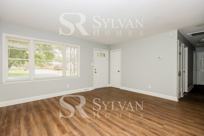 Building Photo - Lease today! No extra charge for contentme...