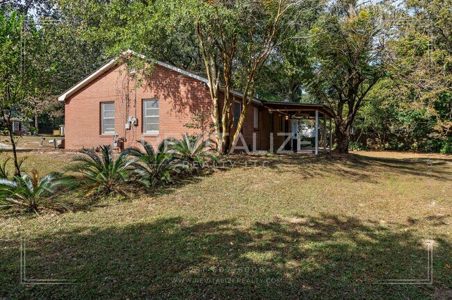 Building Photo - HALF-DEPOSIT SPECIAL!! Updated Brick 3 Bed 1 Bath Home with Huge Yard on Quiet Street!