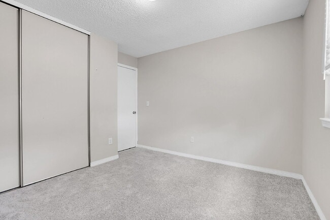 Building Photo - $2,720.95 - 4 bed, 2 bath, located in Aurora with attached Garage and In Unit Washer and Dryer!