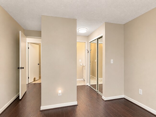Building Photo - Modern Wooded Condo with Upgraded Kitchen & Private Deck