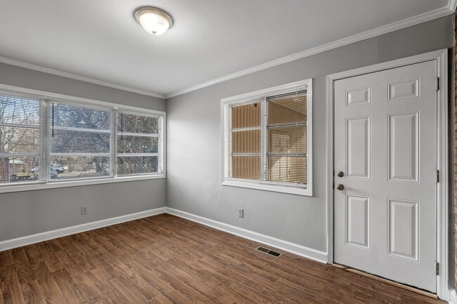 Building Photo - Large Brick Ranch, New Wood Like Flooring Throughout, Just Painted, LR, Den, Sun Room, Carport!