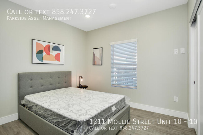 Building Photo - $1,000 Move-in Credit! The Carl on Lauretta