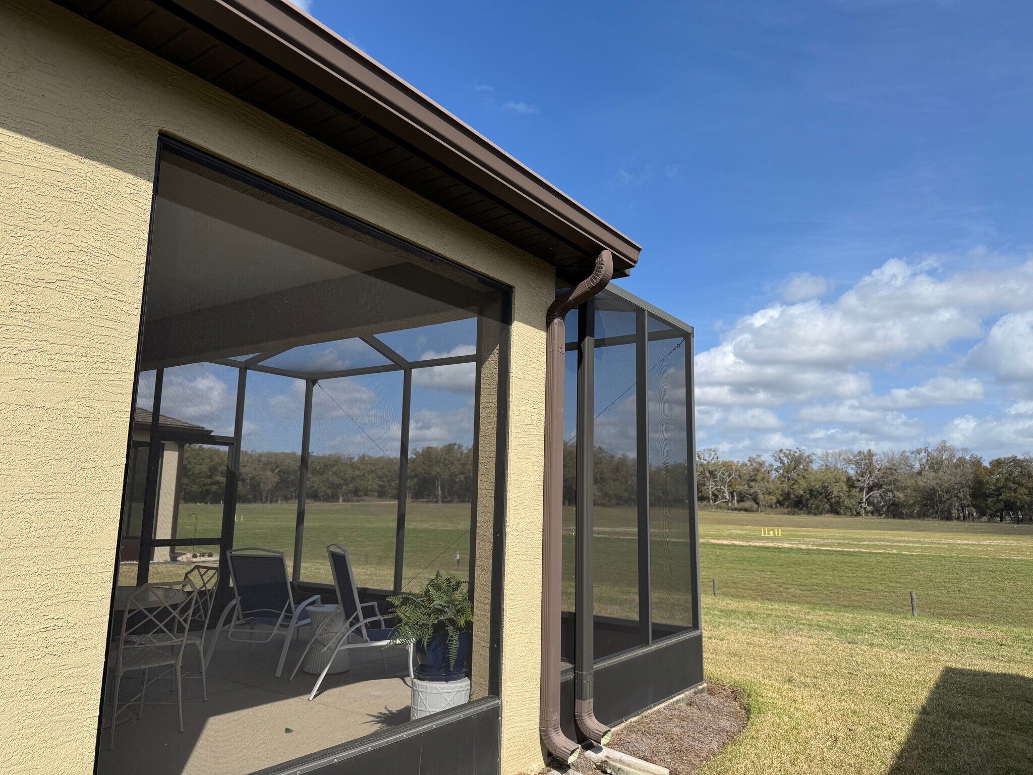 Extended lanai overlooking pasture - 9645 SW 63rd Loop