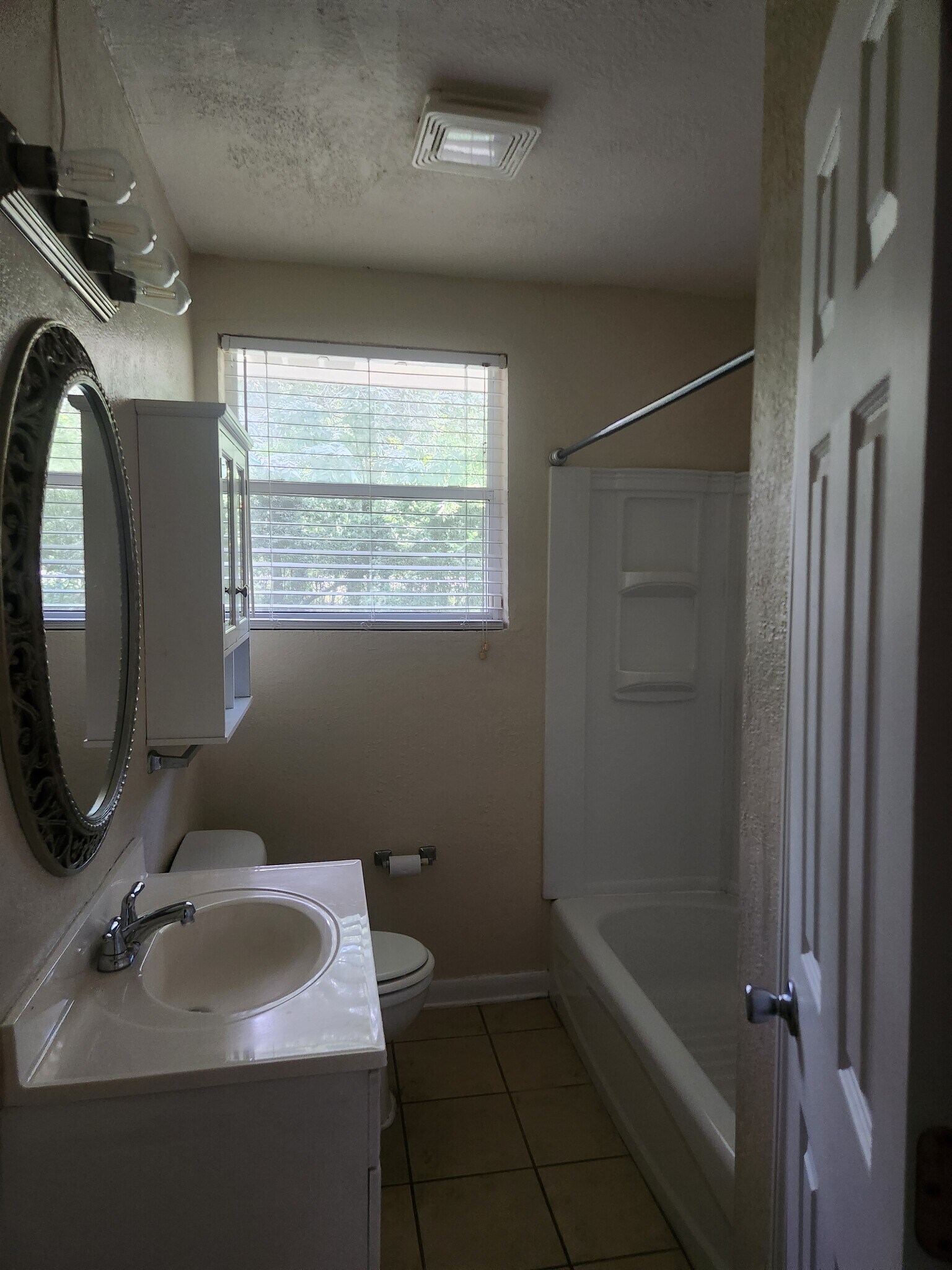 Building Photo - 6945 Woodley Dr