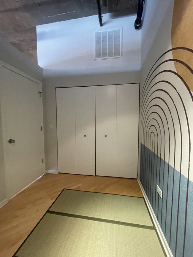 2nd bedroom-custom organizers in closets - 1000 W 15th St