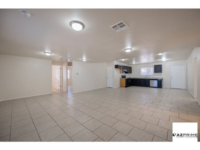 Building Photo - Experience comfort and space in this Custo...