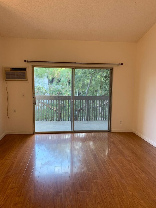 Building Photo - Bright, comfortable, and spacious one bedroom Condominium