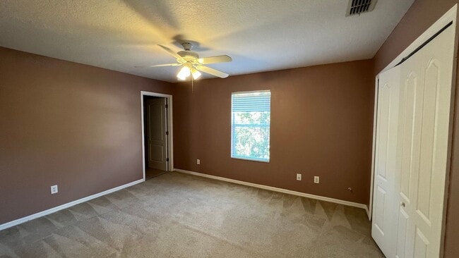 Building Photo - Spacious 4/3.5 Pool Home with Water View & 3-Car Garage in Lee Vista Area (close to Lake Nona)