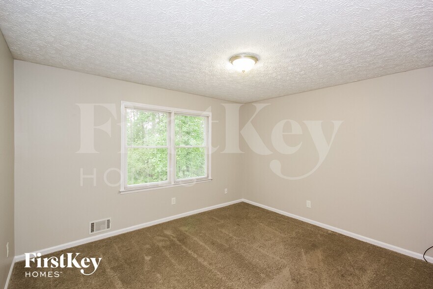 Building Photo - 1105 Honeysuckle Dr