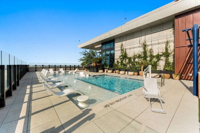 Building Photo - Luxury Condo with Skyline Views