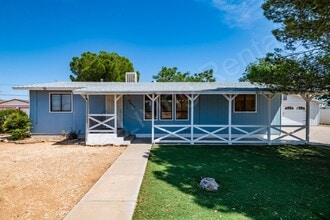 Building Photo - LARGE FENCED YARD WITH DETACHED GARAGE