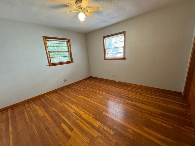 Building Photo - Home Sweet Hardwood: Charming 2 Bed/1 Bath...