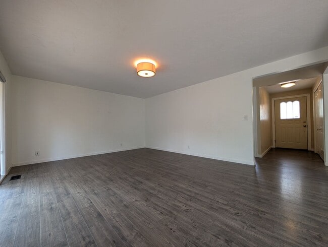 Building Photo - Updated 3-Bedroom, 2.5-Bath Home ~ Solid Surface Flooring and Spacious Kitchen!