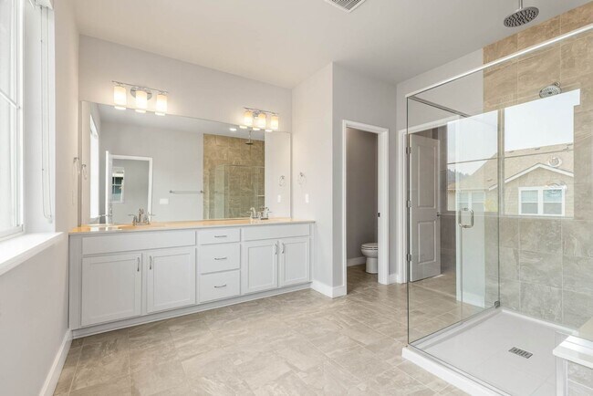 Building Photo - Beautiful River Trail 3 Bedroom Craftsman with Designer Kitchen & Spa-Inspired Primary Suite