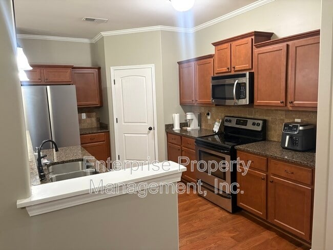 Building Photo - 6153 Lubiani Valley Dr