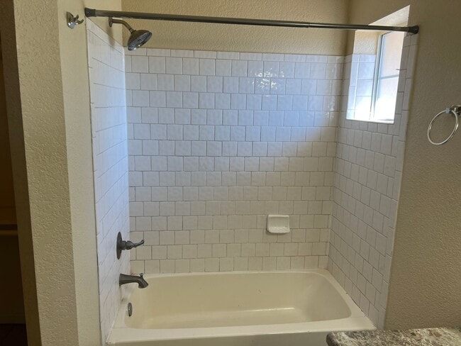 Building Photo - Four Bedroom Mountain View Home with large fenced back yard and double gates